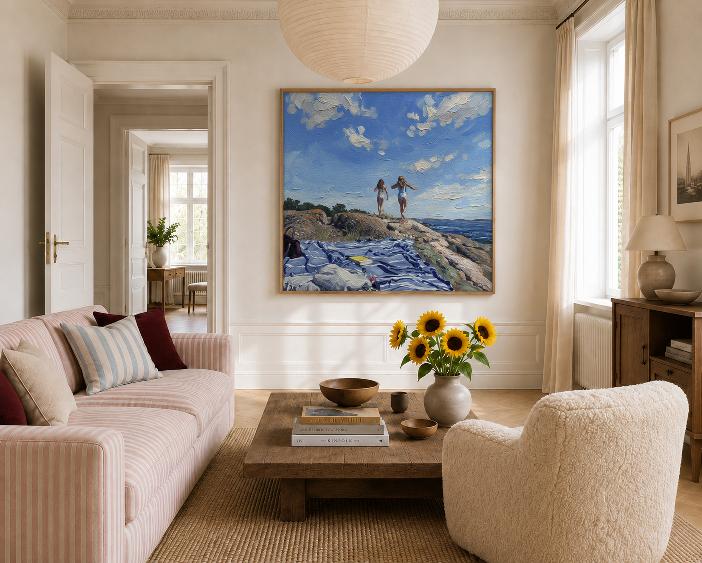 The finished artwork framed above a sofa in a bright living room